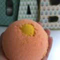 Orange side of Flutter bath bomb with yellow center
